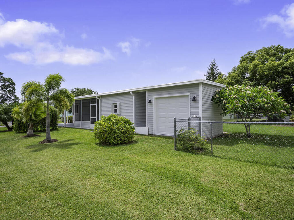 201 Calico Court, Barefoot Bay, FL 32976