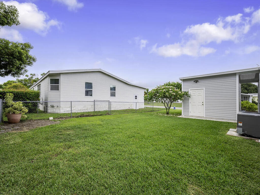 201 Calico Court, Barefoot Bay, FL 32976