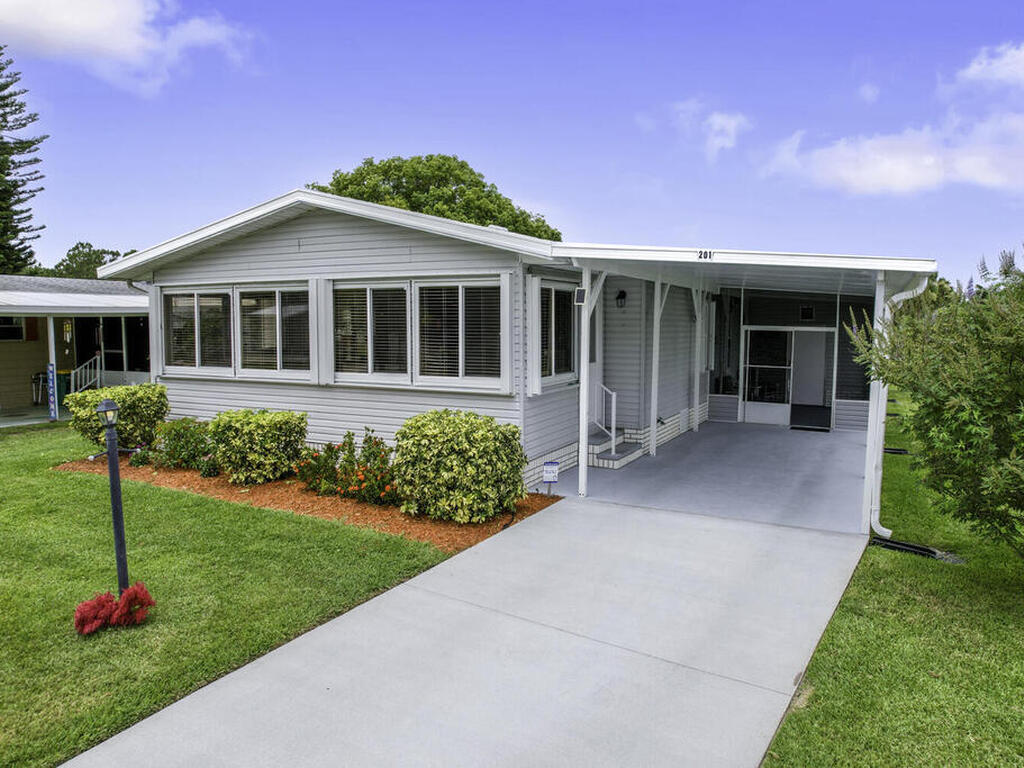 201 Calico Court, Barefoot Bay, FL 32976