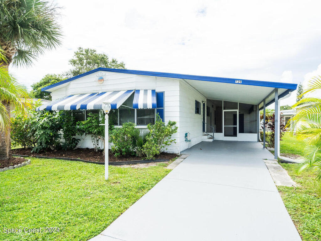 729 Periwinkle Circle, Barefoot Bay, FL 32976