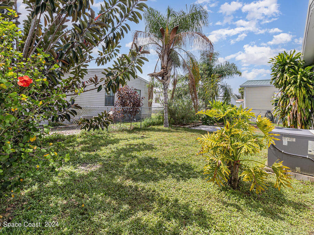 642 Papaya Circle, Barefoot Bay, FL 32976