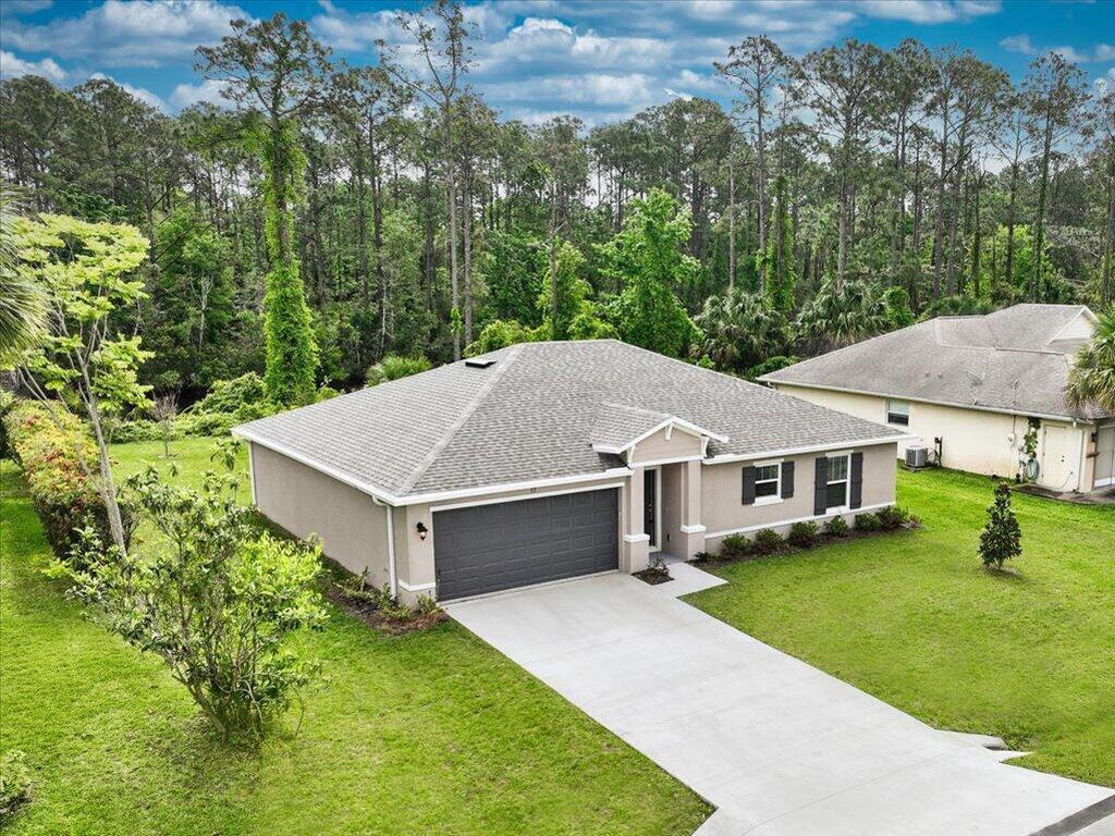 911 Happiness Avenue, Palm Bay, FL 32908