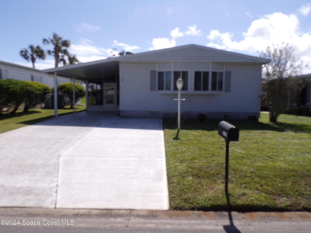 1035 Royal Palm Drive, Barefoot Bay, FL 32976