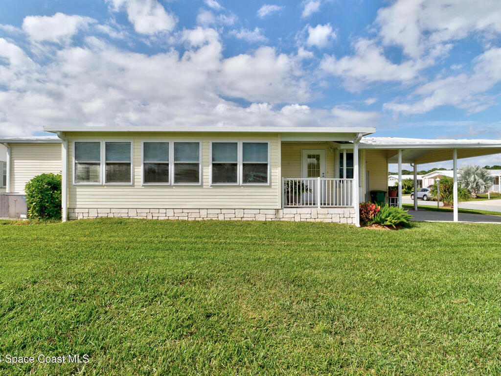 835 Sapodilla Drive, Barefoot Bay, FL 32976