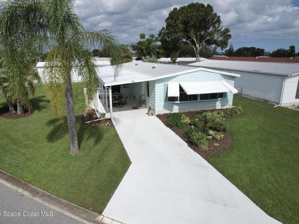 706 Silverthorn Court, Barefoot Bay, FL 32976