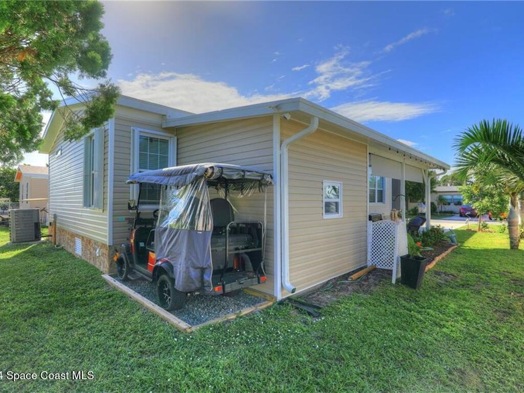 322 Macadamia Drive, Barefoot Bay, FL 32976