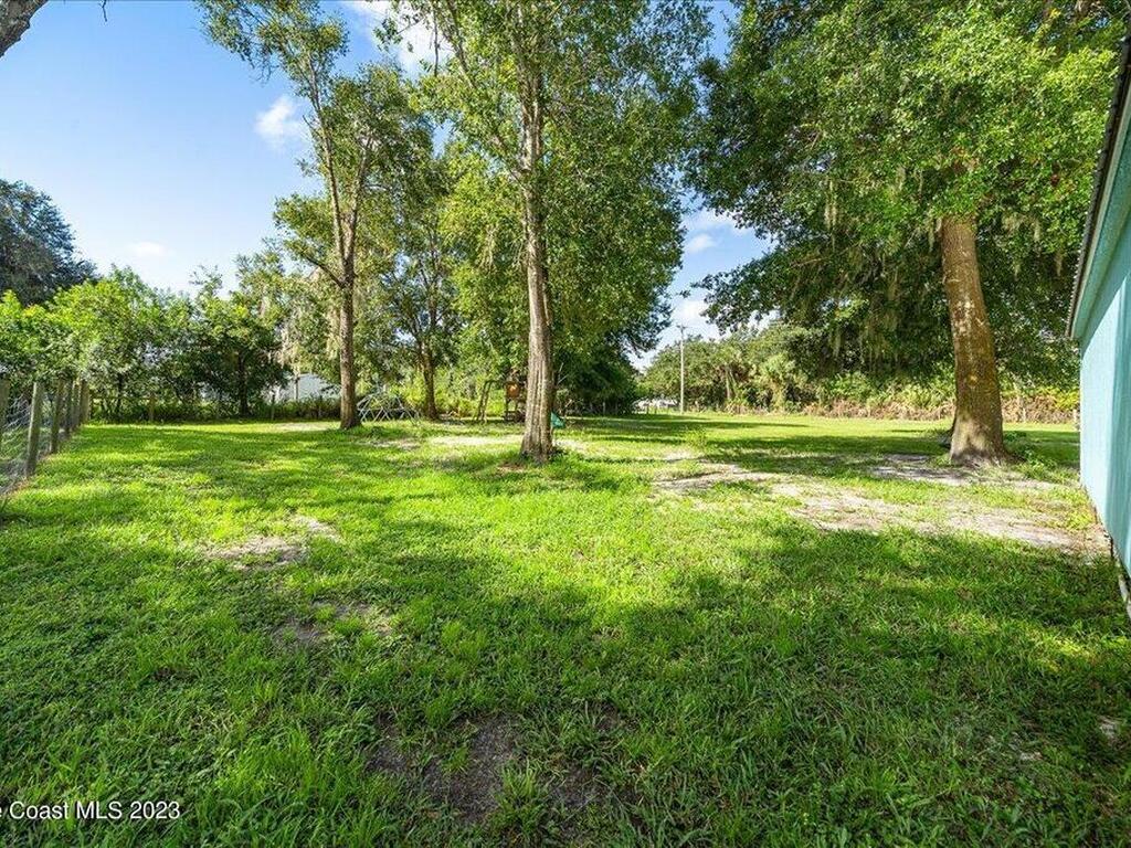 6135 Dixie Way, Mims, FL 32754